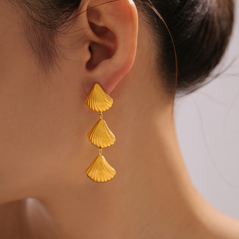 Cross-border ocean series beach wind three shell fringed earrings European and American retro temperament design stainless steel gold-plated