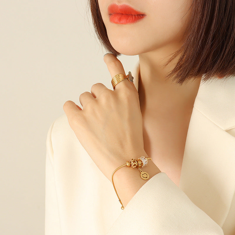 Personality trend Zircon pull-out buckle bracelet bracelet, titanium steel plated 18K gold women's jewelry 99