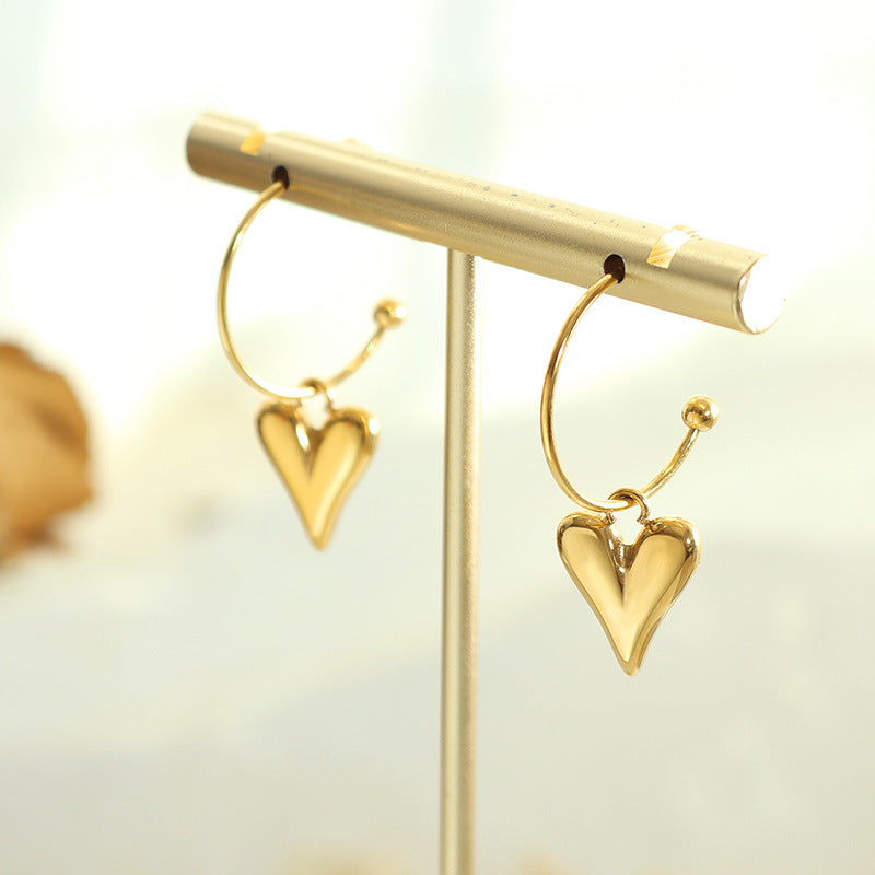 Trend fashion personality love peach heart pendant earrings titanium steel gold-plated temperament ear jewelry F329