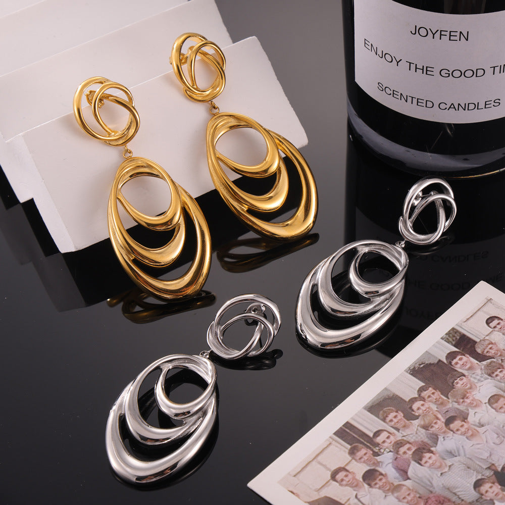 Hip-hop style, unique personality, niche exaggerated earrings, geometric line winding design sense, double-layer titanium steel gold-plated earrings
