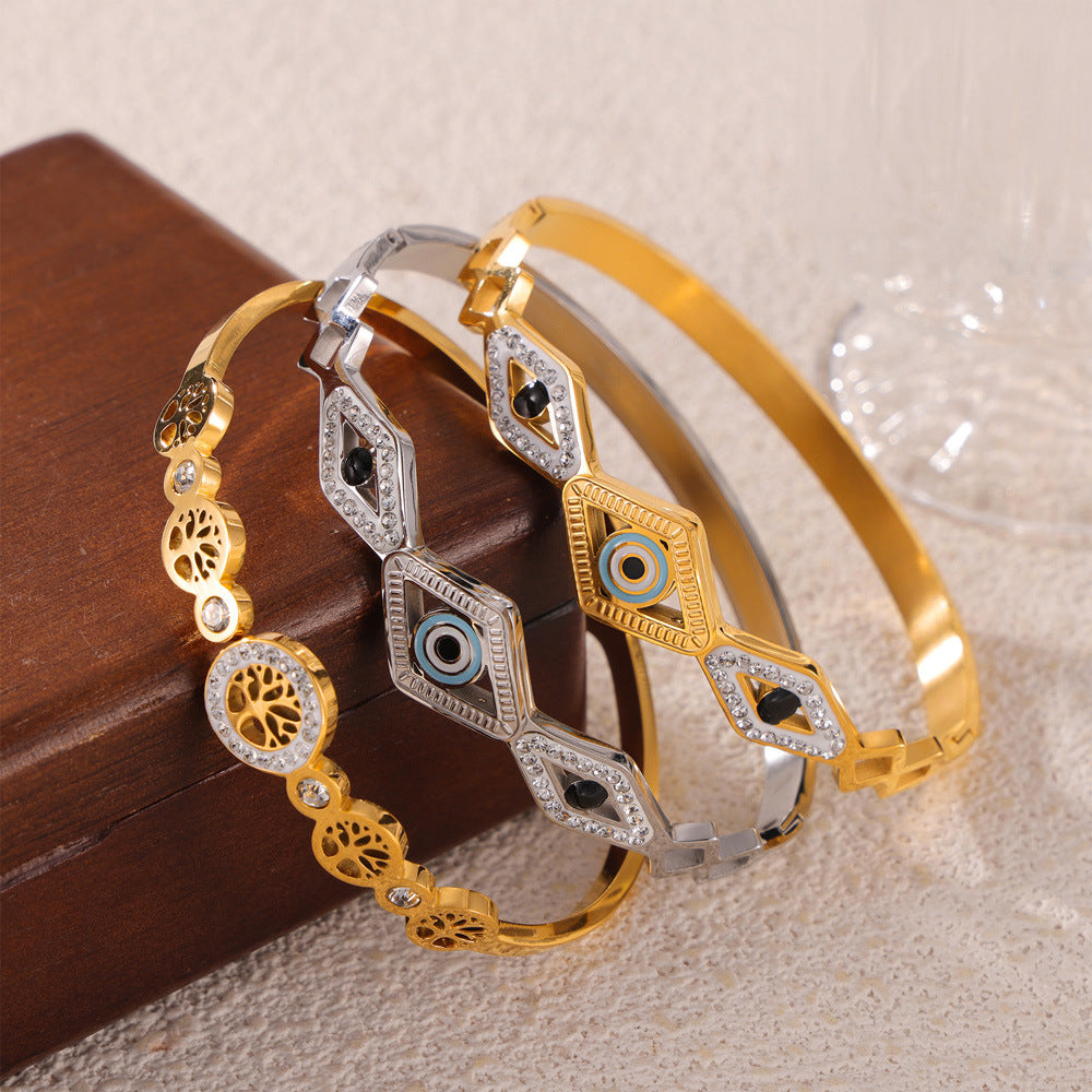Hot-selling niche personalized hollow jewelry devil's eye tree of life diamond-encrusted design titanium steel gold-plated bracelet pp