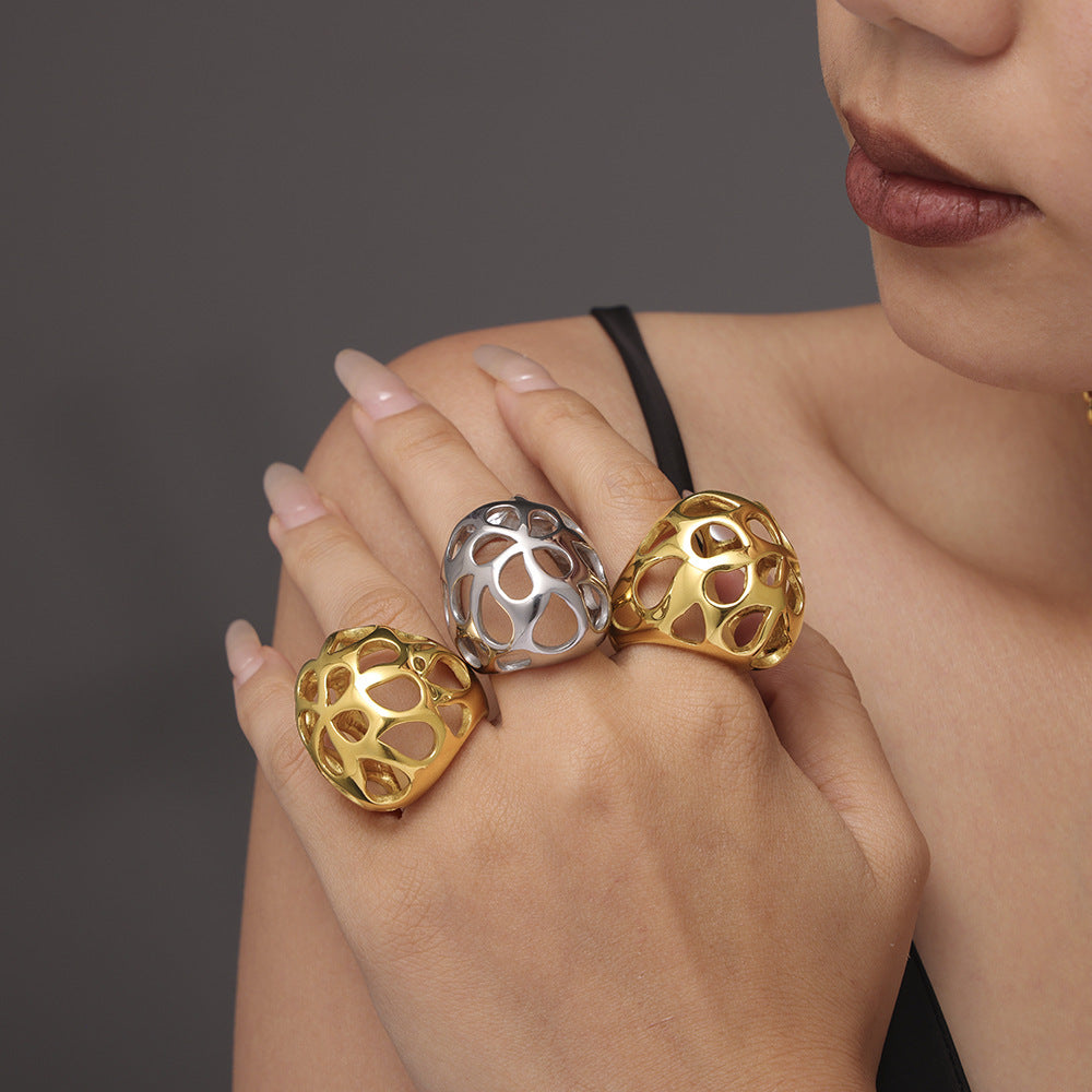 Large glossy hollow exaggerated heavy industry ring women's stainless steel plated 18K real gold color retention spot