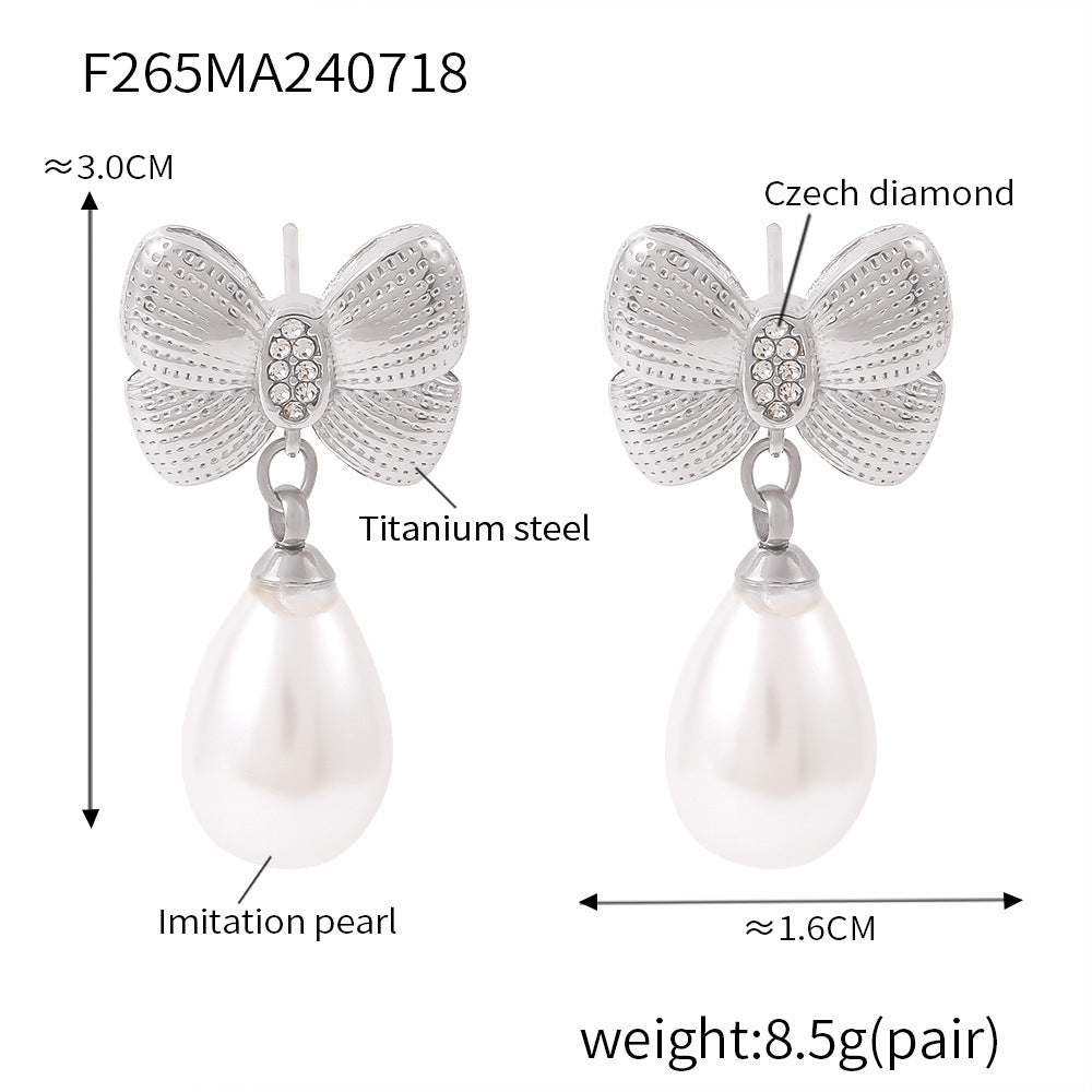 Bow tassel imitation pearl earrings women's niche diamond-set titanium steel-plated 18k gold fashion earrings 99