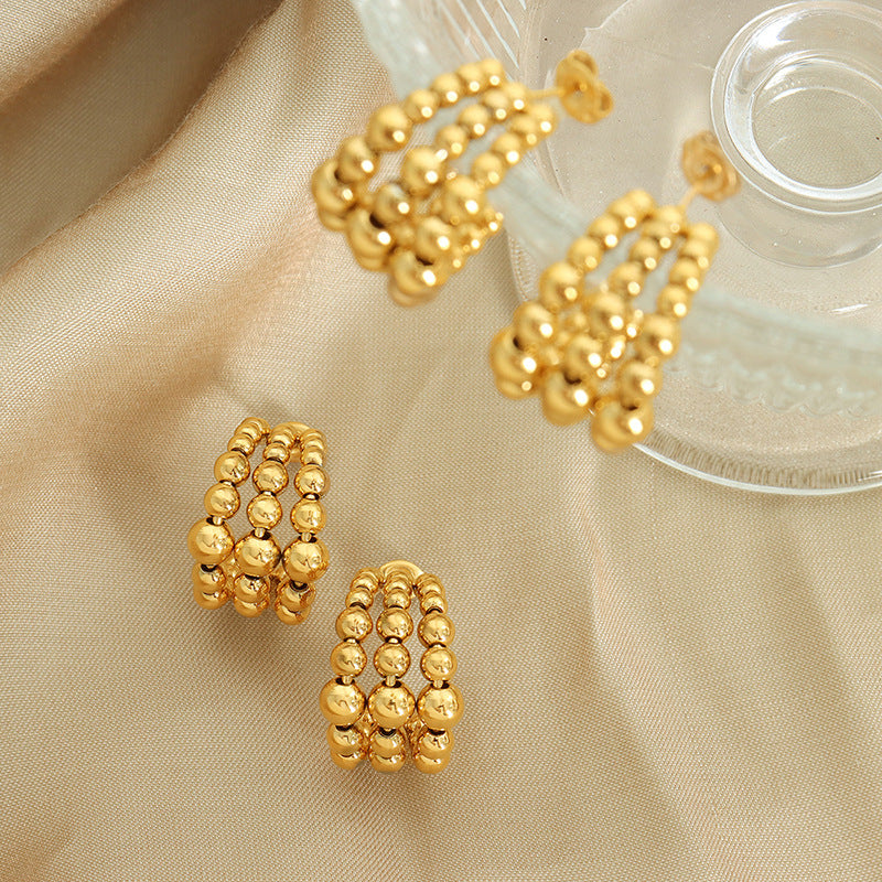 C-shaped semicircular three-layer steel ball splicing niche design metal texture fashionable personalized titanium steel plated K gold earrings