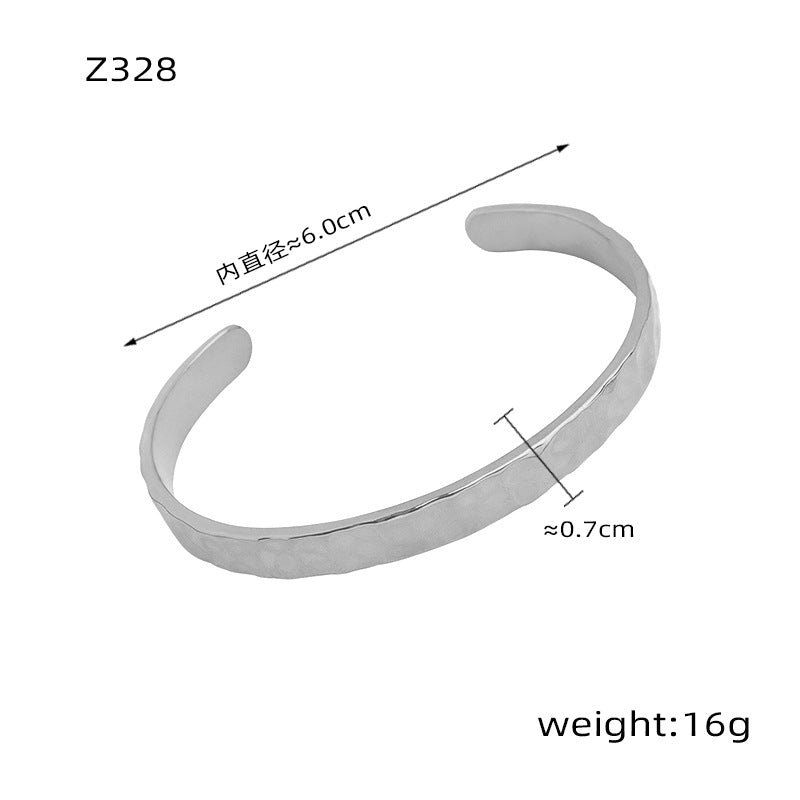 New simple personality niche design titanium steel gold-plated irregular concave-convex hammer surface opening bracelet women's jewelry wholesale 99