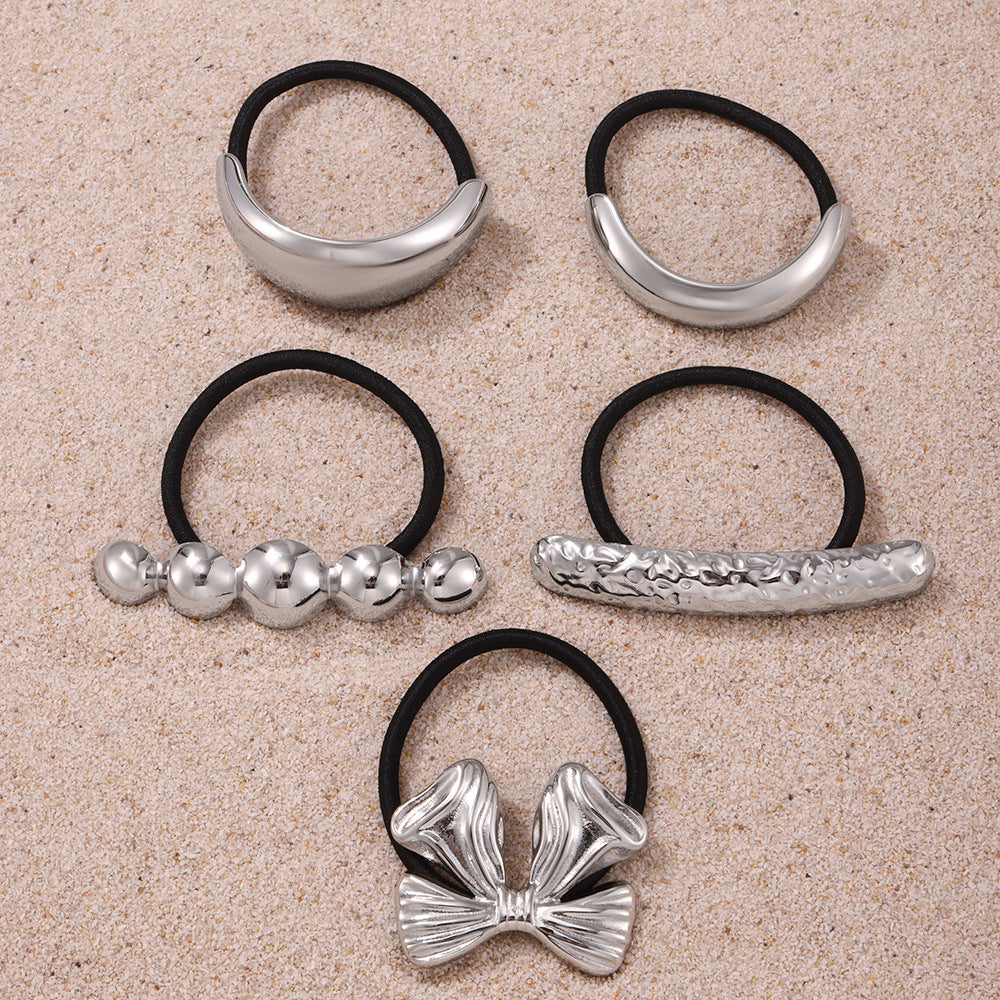 Stainless steel bow hair rope plated with 18K real gold European and American exaggerated hair band ponytail elastic headrope hair accessories