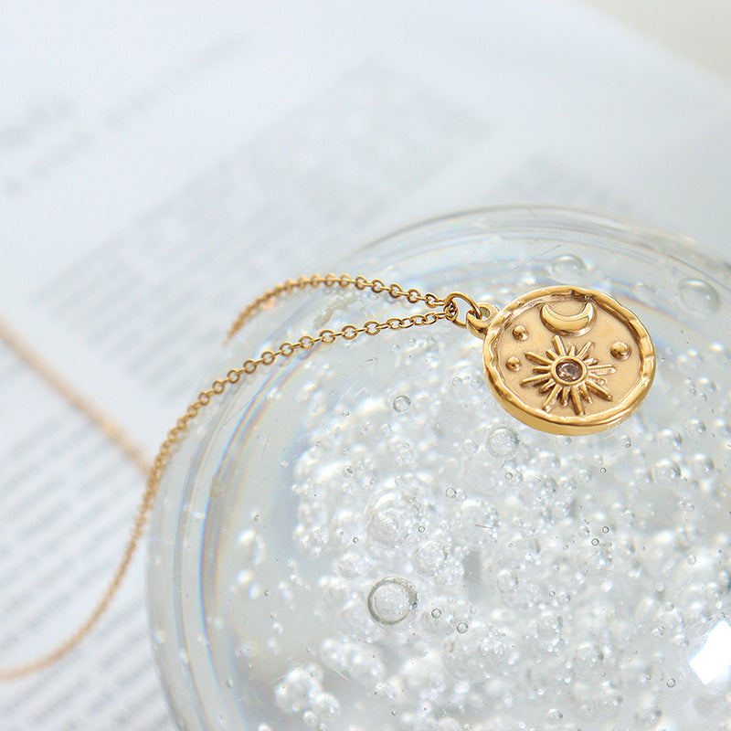 Geometric cold wind versatile zircon star and moon romantic necklace, titanium steel gold-plated round pendant necklace.