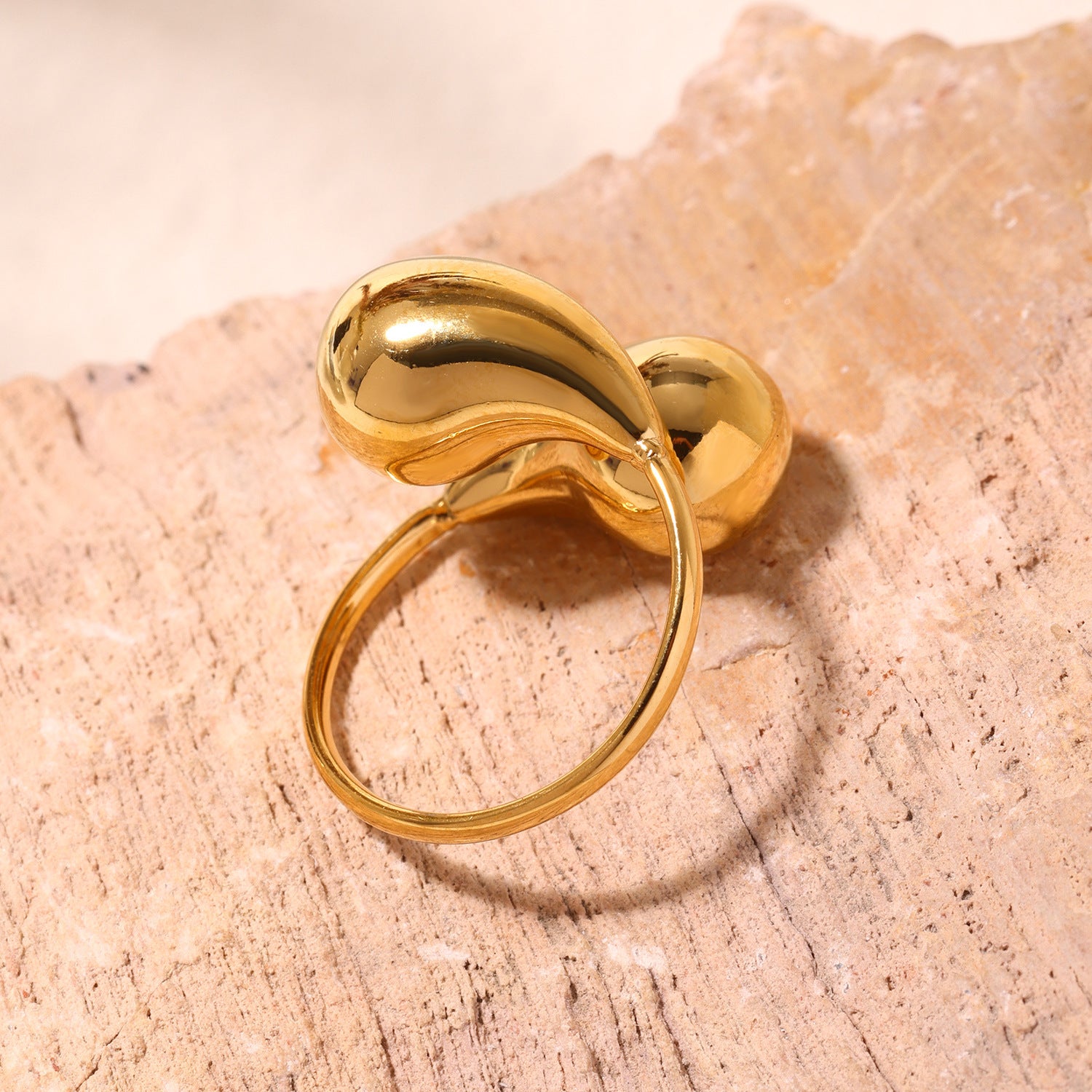 Stainless steel hollow opening comma water drop ring tail ring plated 18K real gold non-fading jewelry wholesale