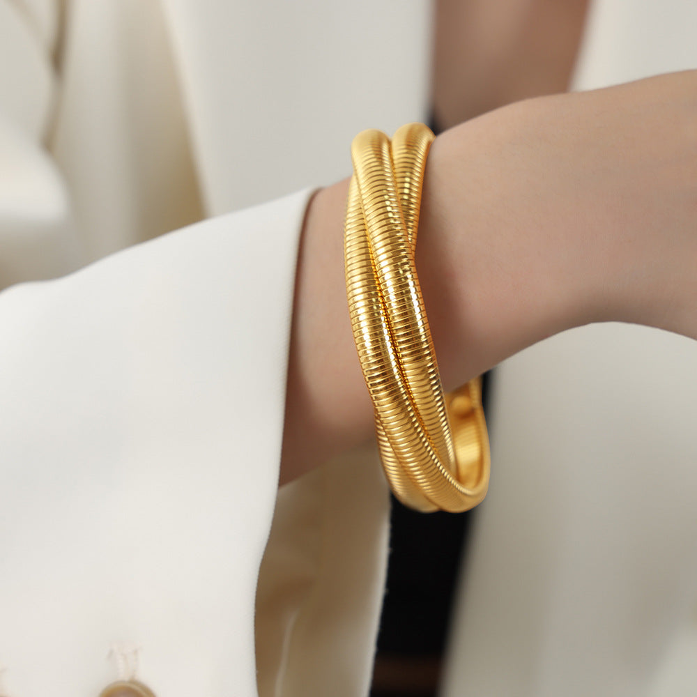 Hot-selling light luxury fashion gold-plated three-layer bracelet titanium steel serpentine winding elastic bracelet jewelry women 99