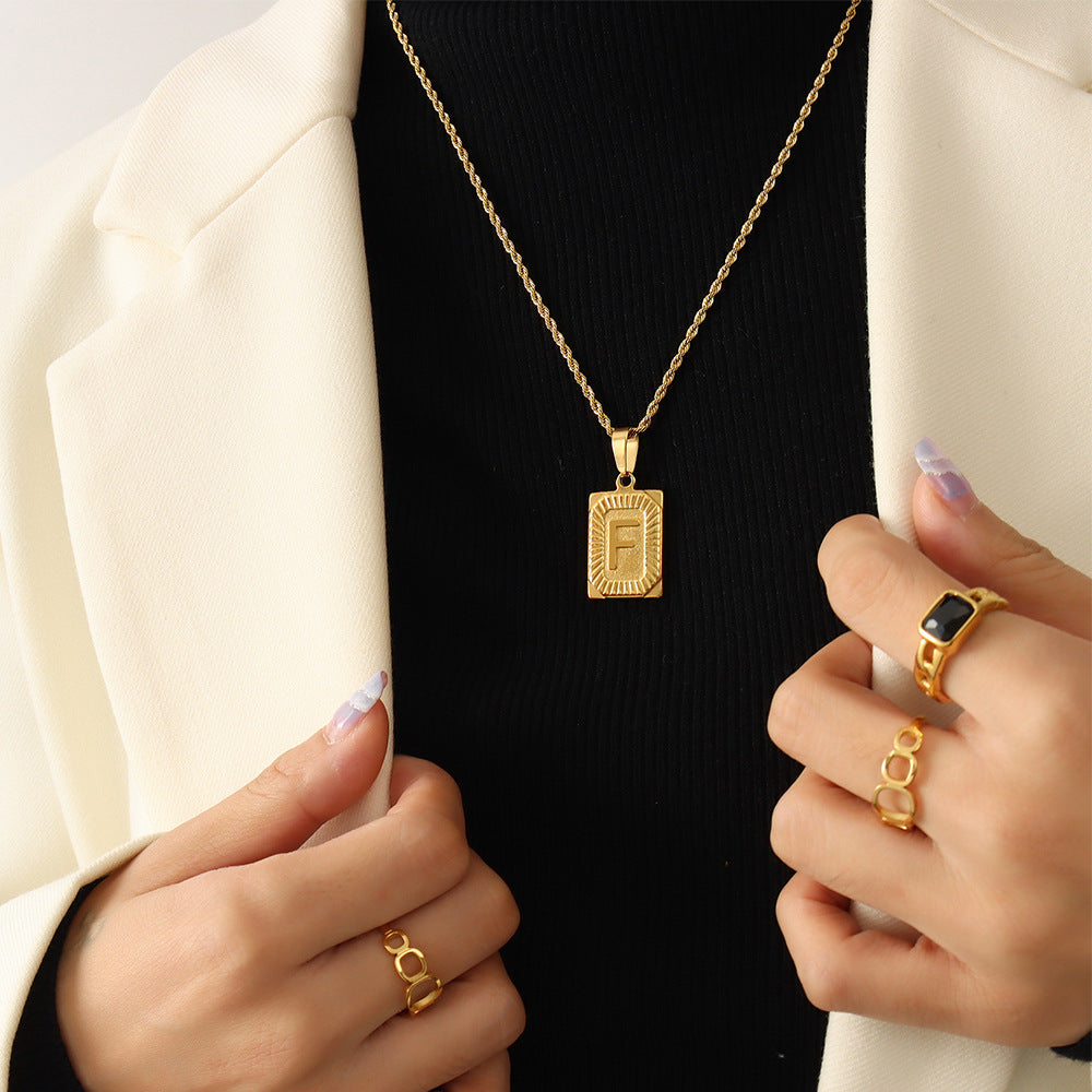 Cold wind niche light luxury retro high-end sense tag necklace titanium steel plated 18K real gold women's jewelry