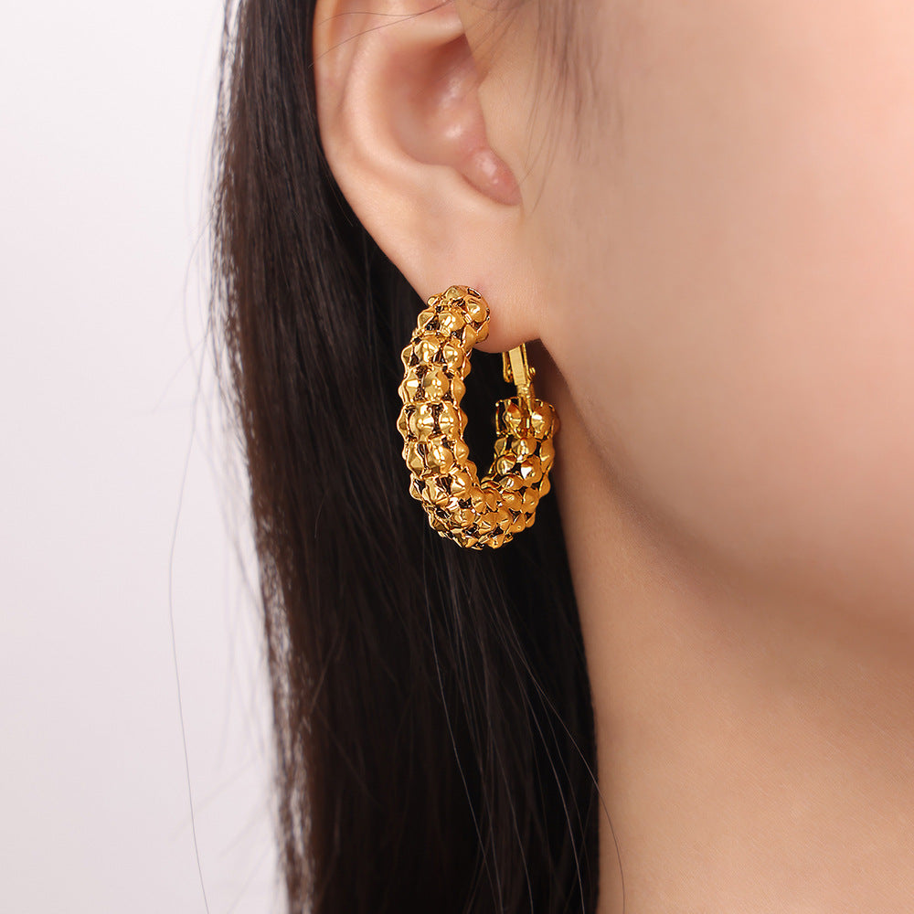 New fashion style personalized design niche hollow titanium steel gold-plated geometric earrings jewelry women's wholesale