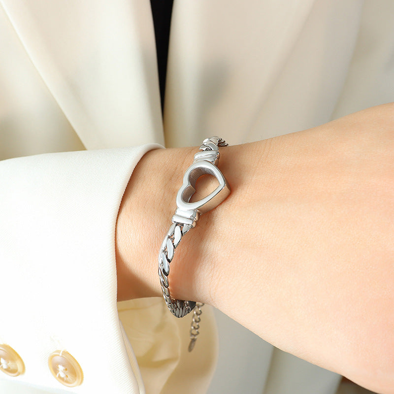 Trendy fashion hip-hop wind titanium steel gold-plated personalized bracelet, hollow love versatile niche design hand jewelry