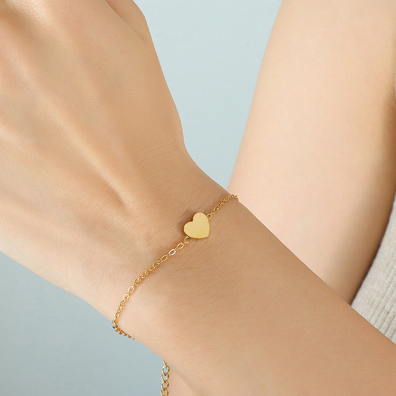 Internet celebrity small love bracelet female, versatile simple titanium steel bracelet, plated with 18K real gold, non-fading and non-allergic E072
