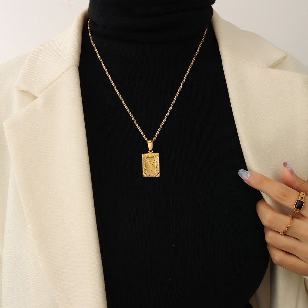 Cold wind niche light luxury retro high-end sense tag necklace titanium steel plated 18K real gold women's jewelry