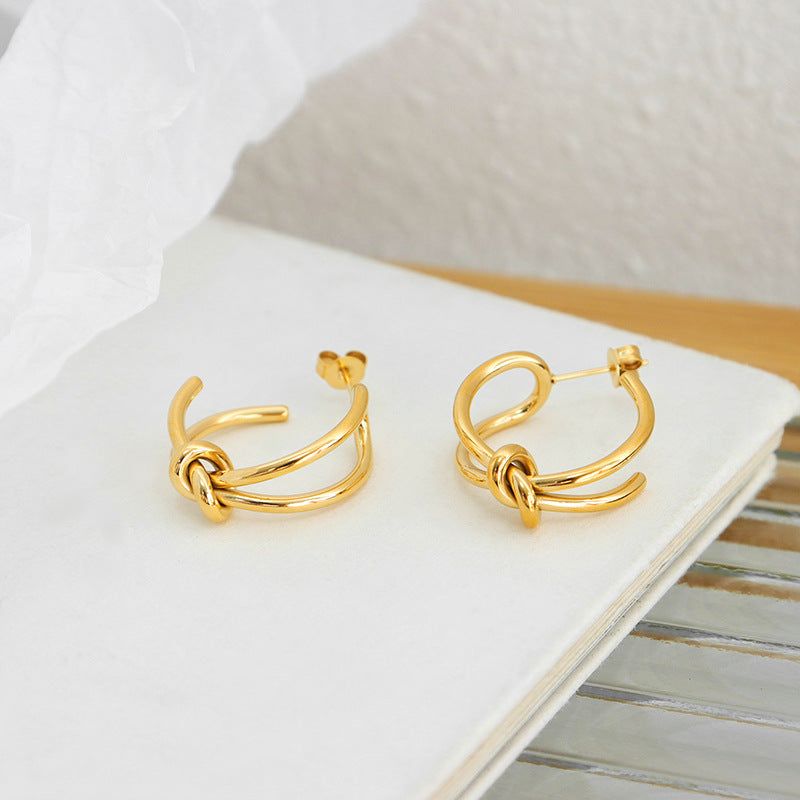 Unique creative personality niche design sense hot-selling rope knot earrings metal texture titanium steel gold-plated earrings pp