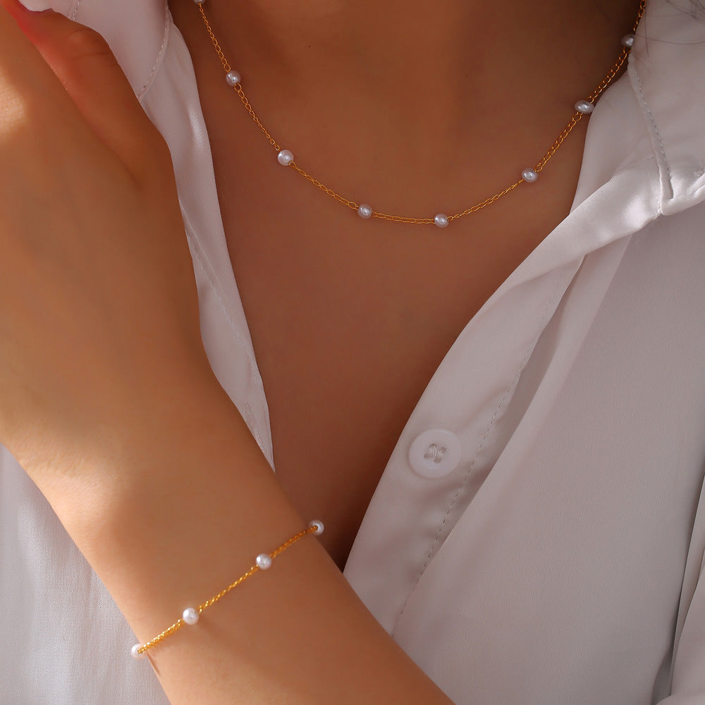 Hepburn style temperament elegant niche minimalist jewelry gentle bead beaded design titanium steel gold-plated jewelry set