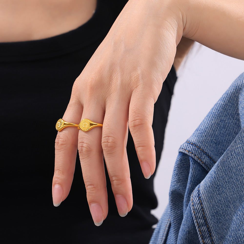 Fashion personality niche cold wind jewelry engraved wreath surrounding the sun design titanium steel gold-plated ring pp
