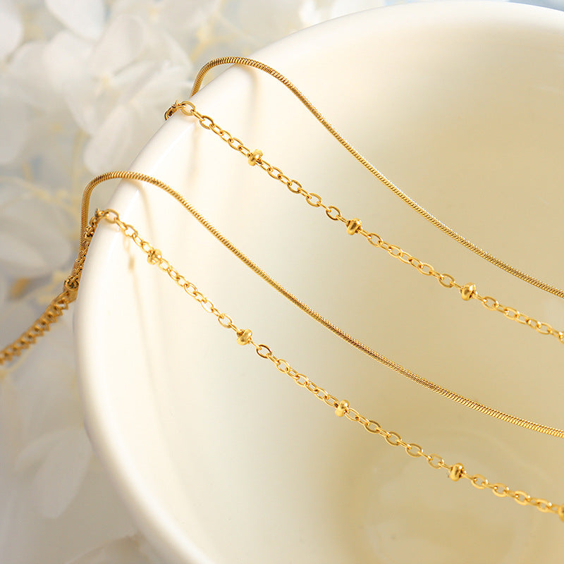 Jewelry Detailed Double-layer Snake Bone Chain Exquisite Bracelet Bag Bead Chain Titanium Steel Plated 18K Gold Jewelry E08599