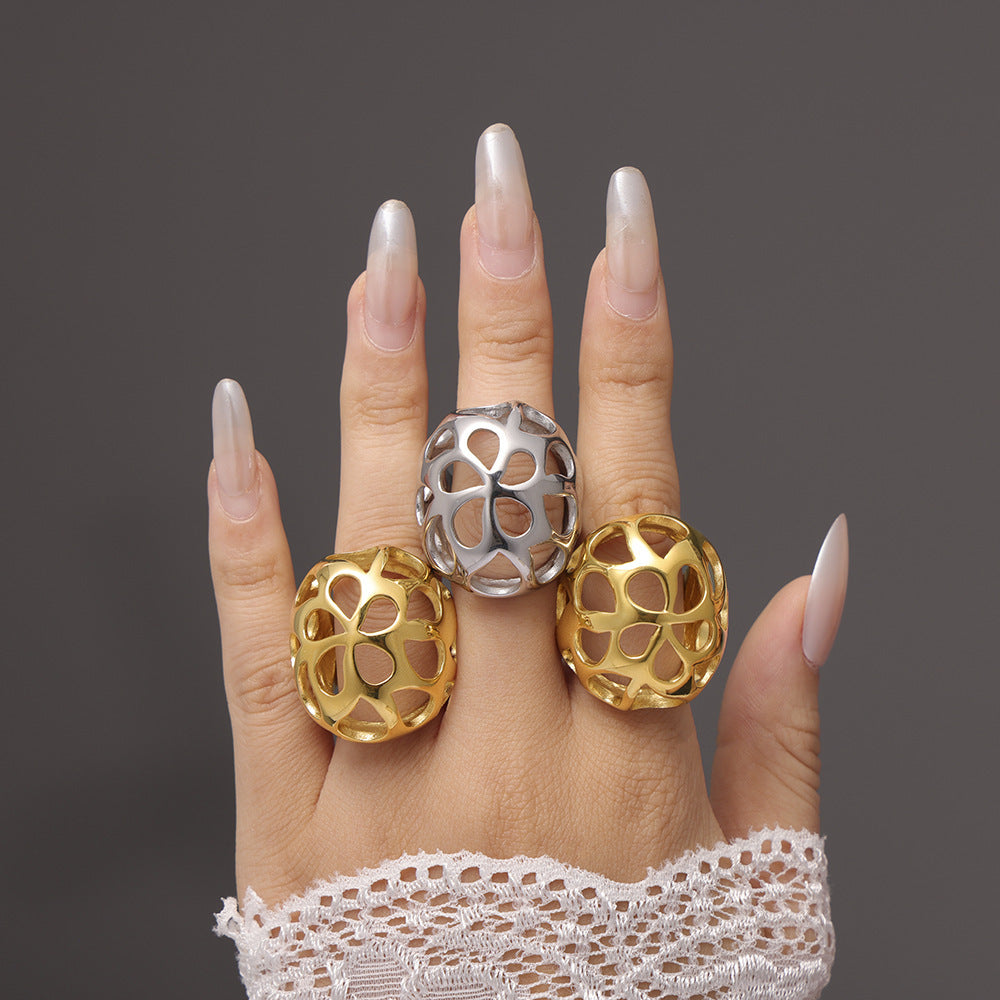 Large glossy hollow exaggerated heavy industry ring women's stainless steel plated 18K real gold color retention spot