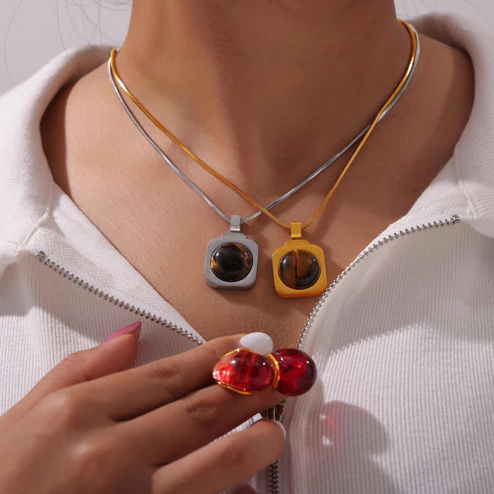 Hot-selling personalized light luxury jewelry inlaid with tiger's eye design titanium steel jewelry set pp