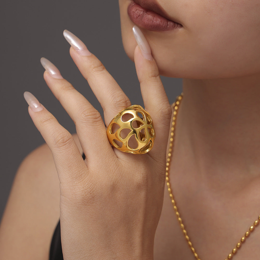 Large glossy hollow exaggerated heavy industry ring women's stainless steel plated 18K real gold color retention spot
