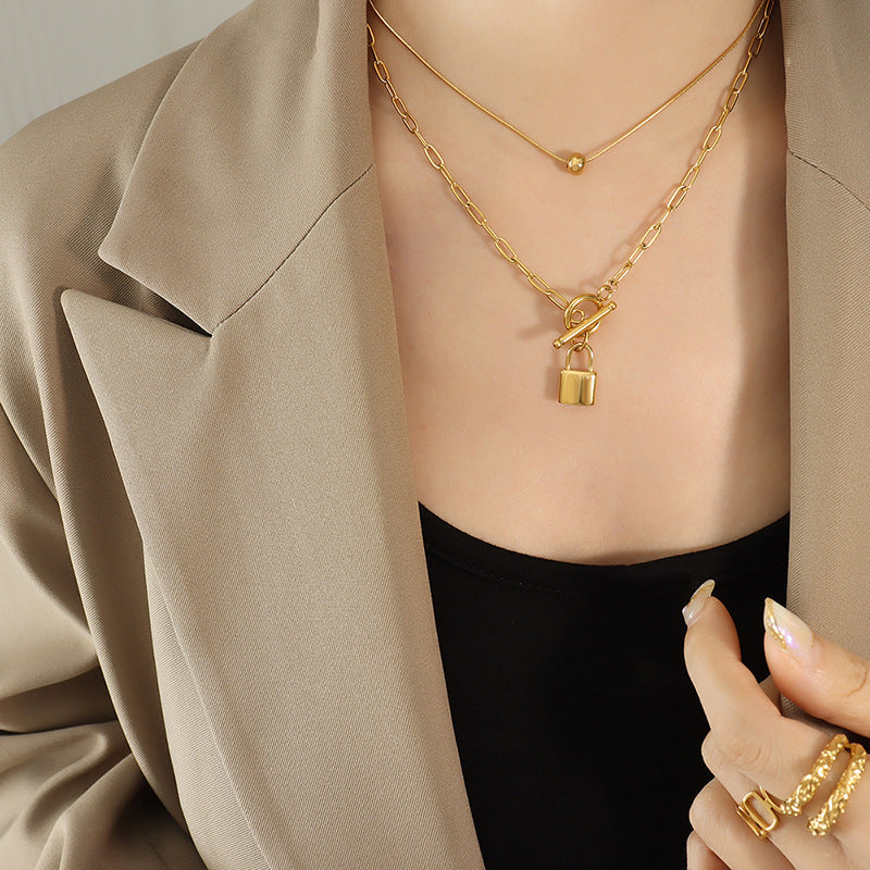 Cold and trendy OT buckle with two locks, steel ball pendant stacked with titanium steel necklace, exquisite women's jewelry 99.