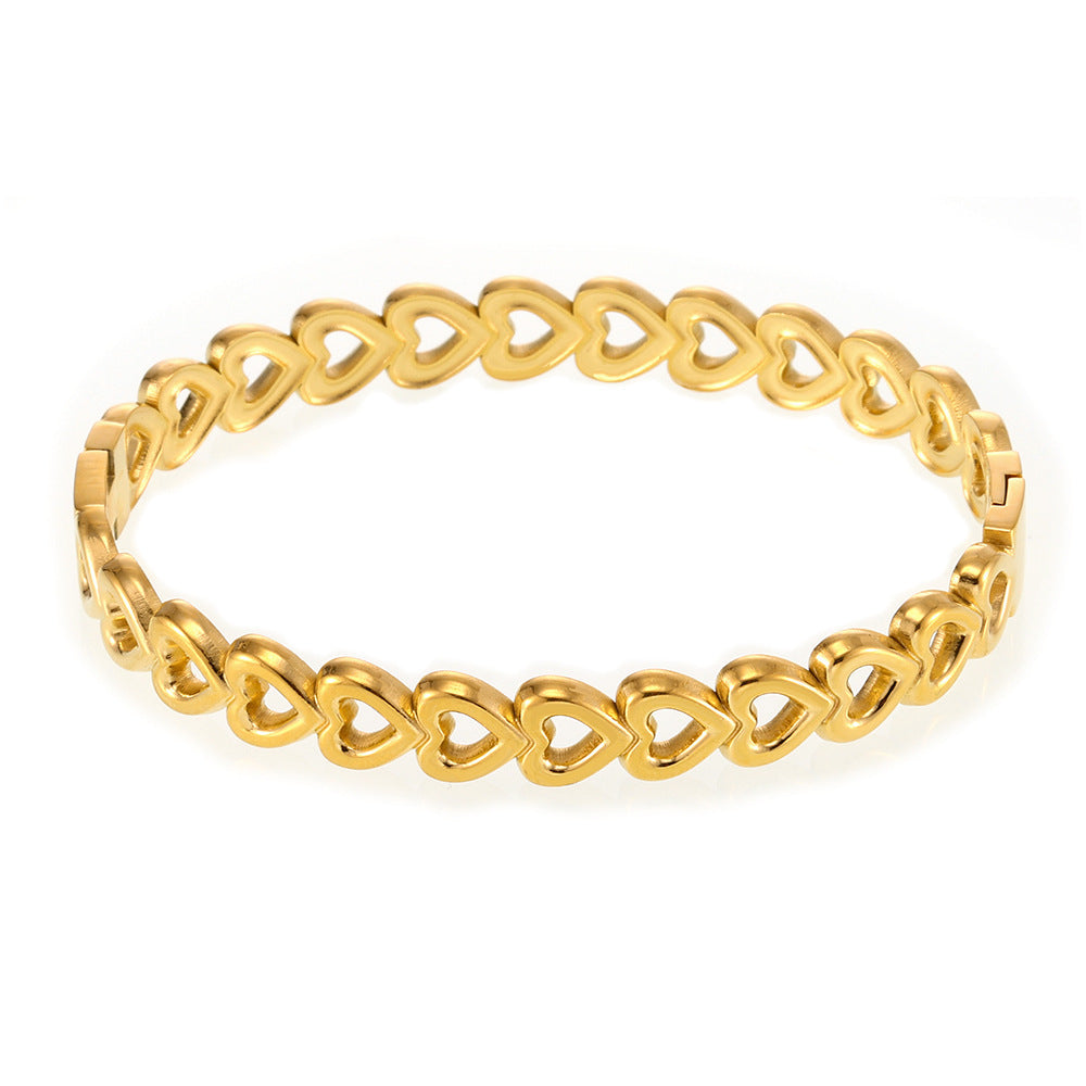 Hollow love splicing bracelet fashion commuter titanium steel PVD electroplating 18K real gold does not fade factory wholesale