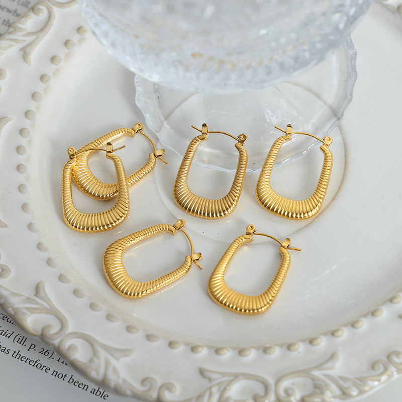 New light luxury high-end personality exaggerated geometric U-shaped titanium steel earrings simple cold wind jewelry women