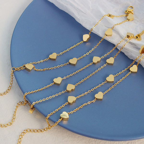 Cold wind light luxury retro trend simple double-layer peach heart titanium steel plated 18 real gold bracelet E054