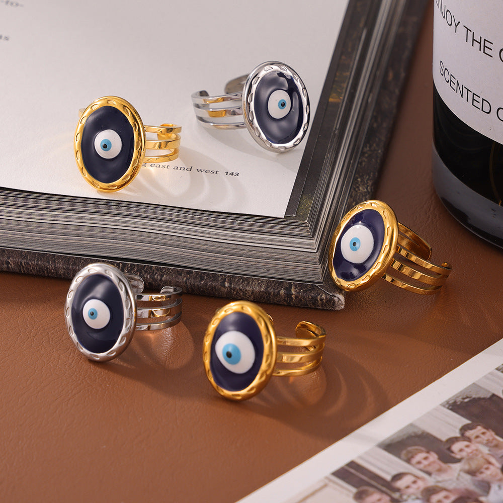 Hot-selling niche devil's eye shape ring, personalized drip oil design, multi-layer hollow titanium steel ring pp